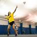 Evie VanDeWege of Pioneer girls tennis team retunes the ball  during practice Thursday night.
Courtney Sacco I AnnArbor.com 